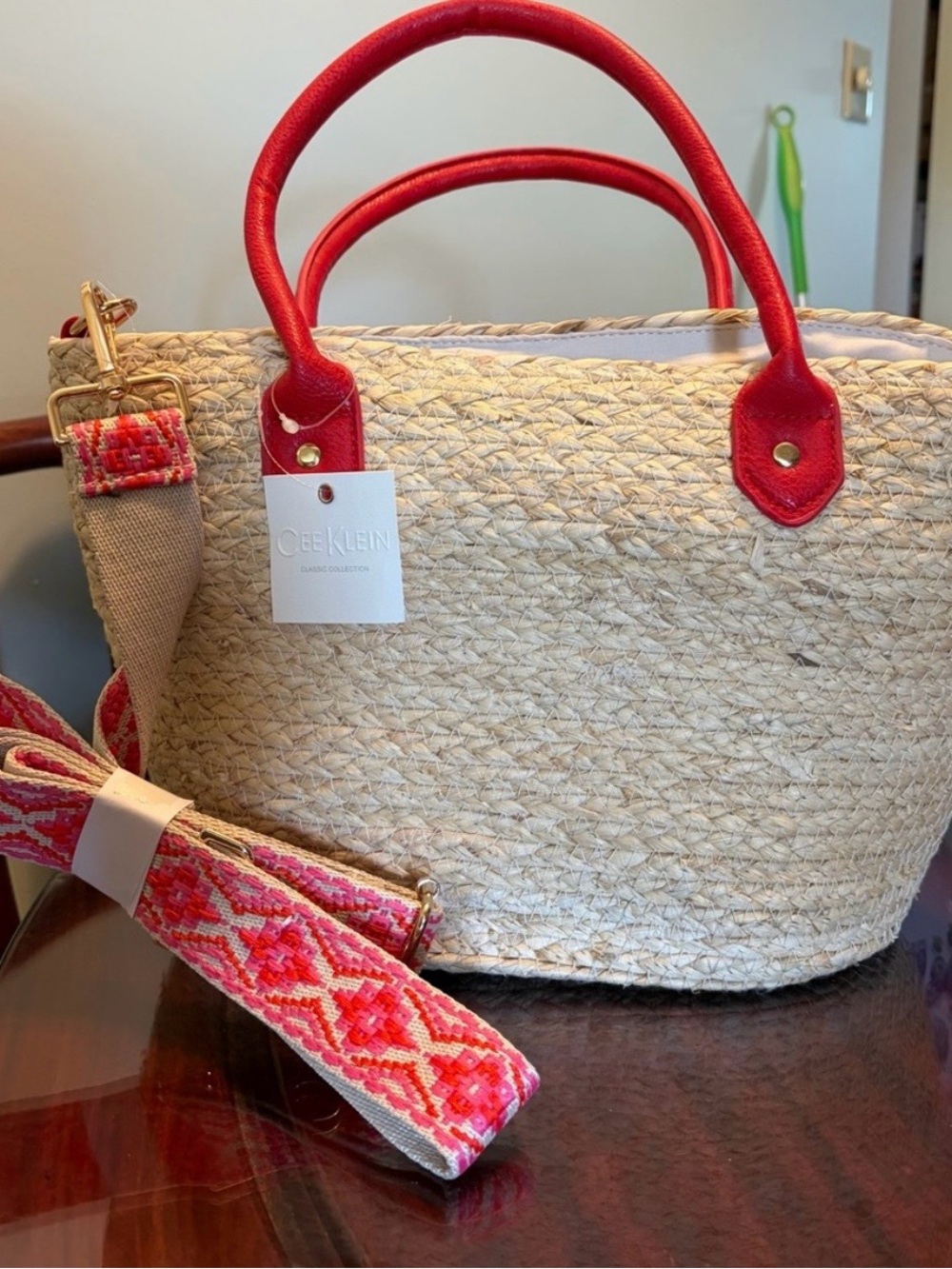 Straw Tote with Red Handles and Decorative Strap Cee Klein